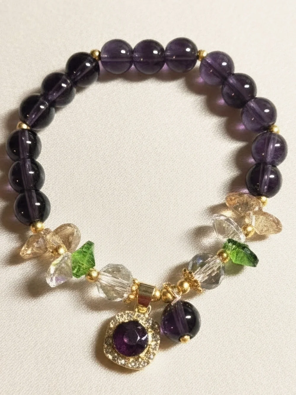 Amethyst Beaded Charm Bracelet with Gold Accents and Green Highlights